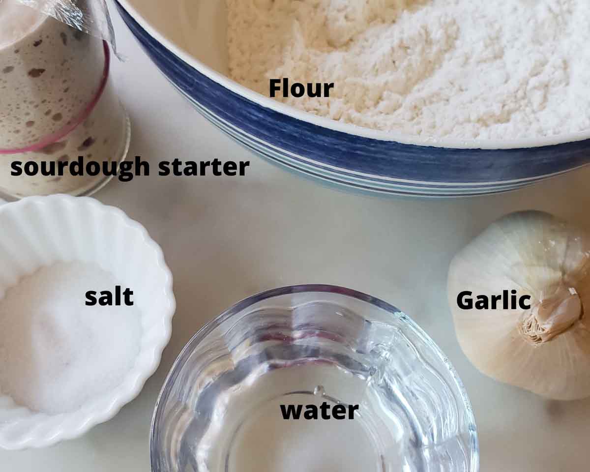 image of all the ingredients needed to make the garlic sourdough bread recipe