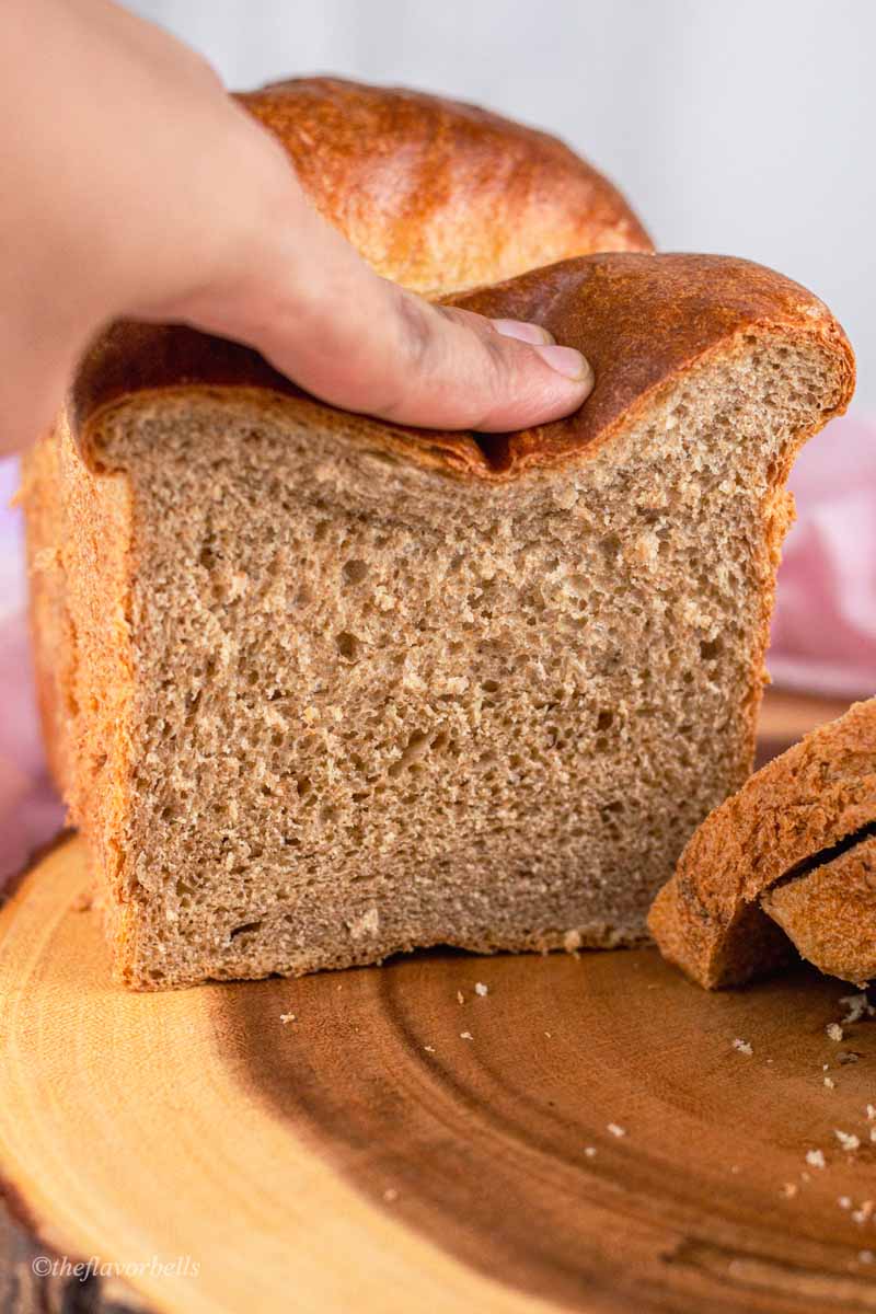 squeezed bread to show super fluffy and soft texture