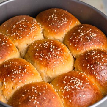 homemade sourdough rolls in a pan