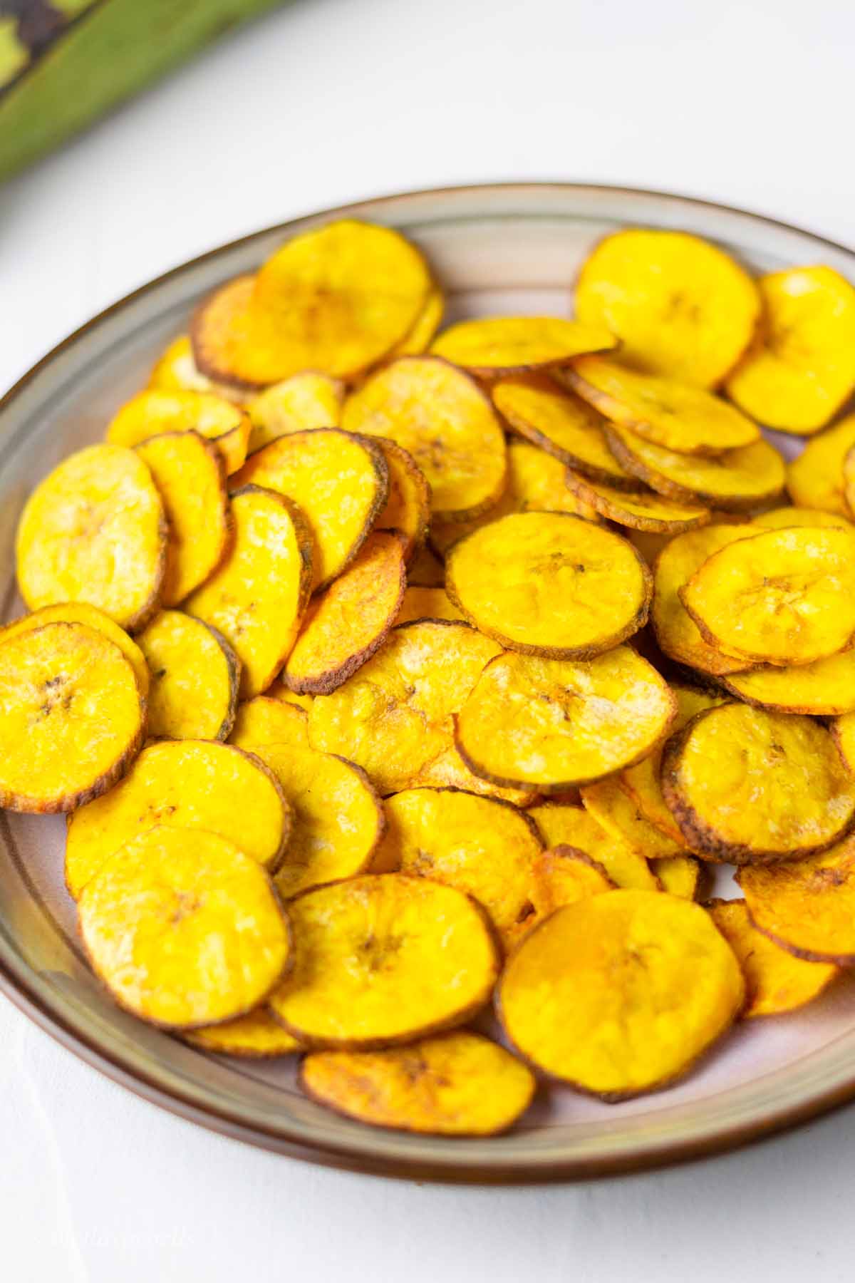 air fried plantain chips colored with turmeric