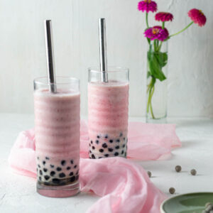 two glasses filled with boba smoothie