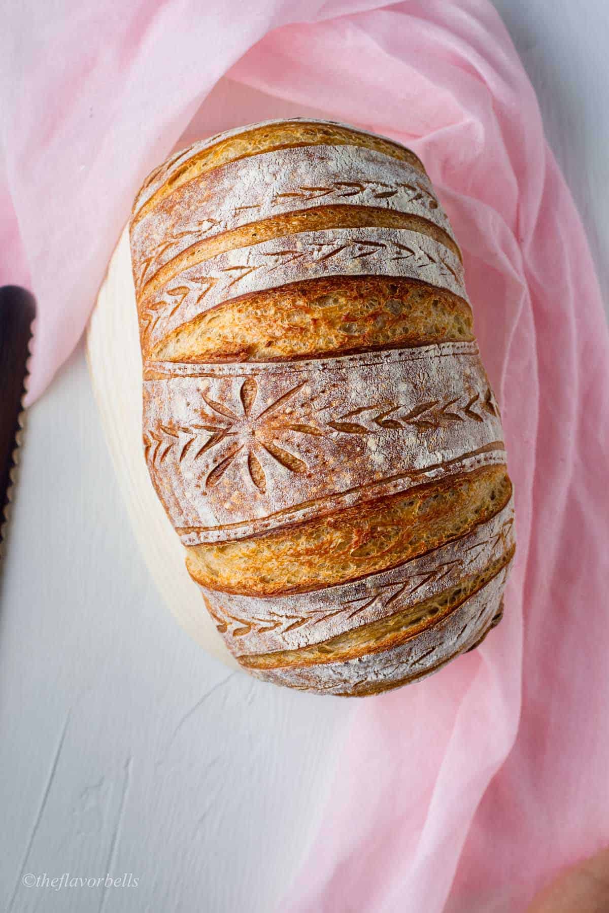 same day sourdough bread with decorative scoring