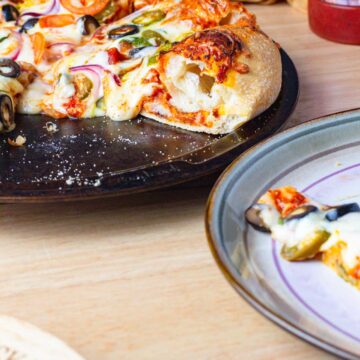 a veggie pizza made using the poolish