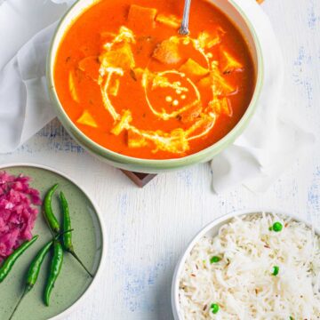 paneer dunked in luscious creamy curry