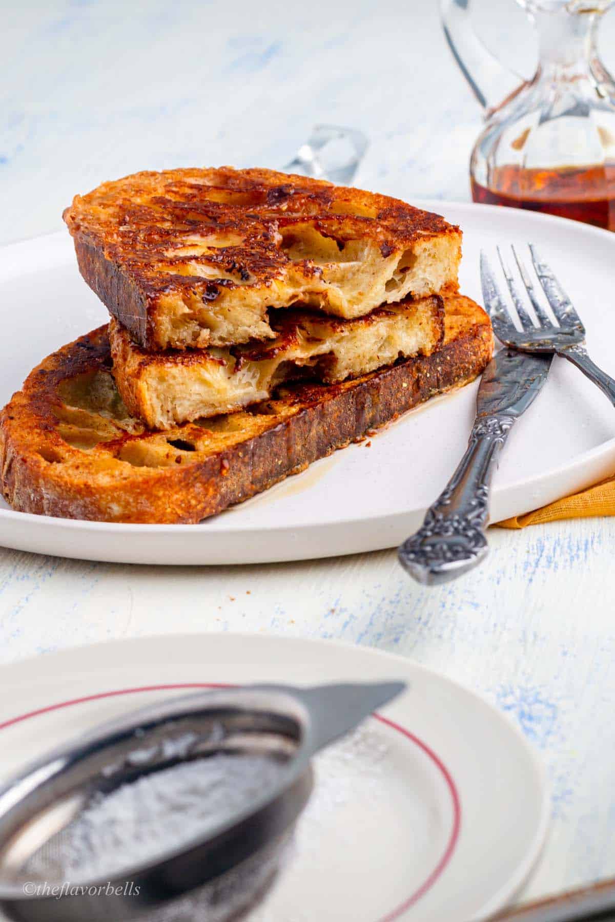 a sliced sourdough french toast showing the delicious texture