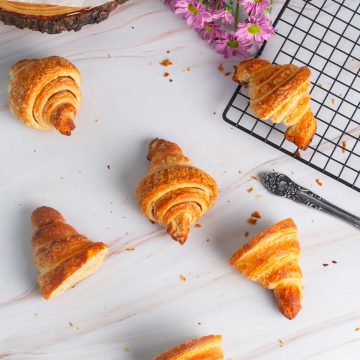 whole and sliced homemade croissants