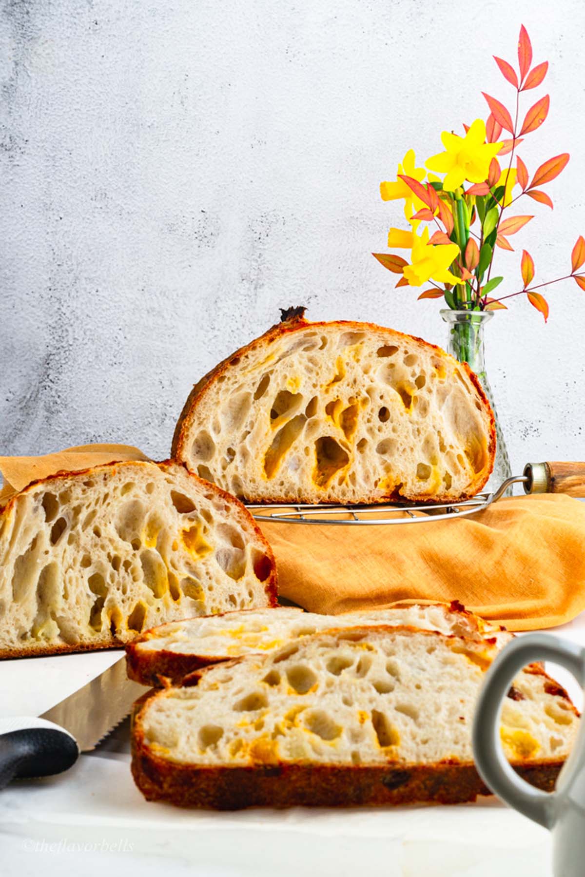 a look at the loaf with open crumb filled with cheddar and mozzarella cheese