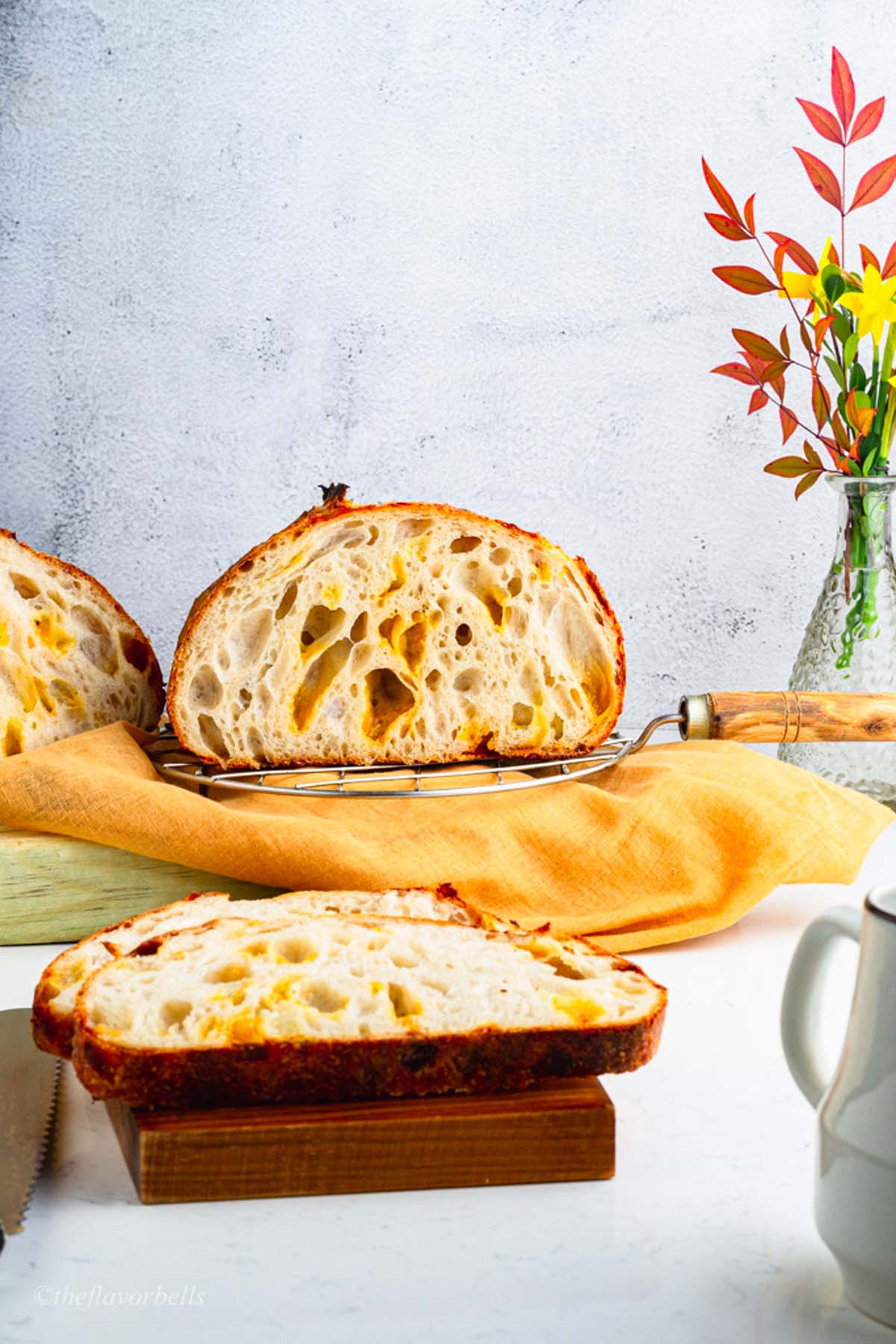 sliced loaf of cheesy sourdough bread