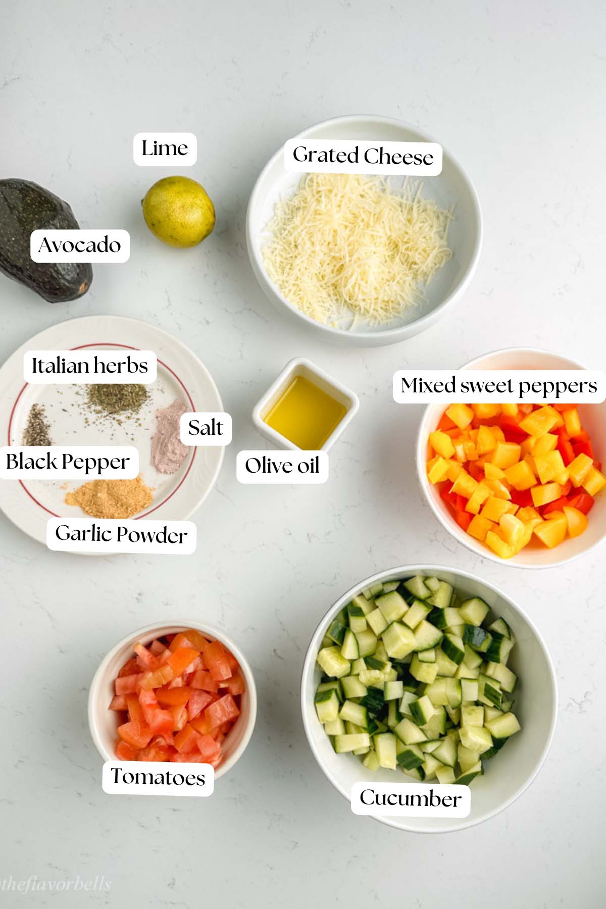 image showing all the ingredients needed for making sweet pepper and cucumber salad