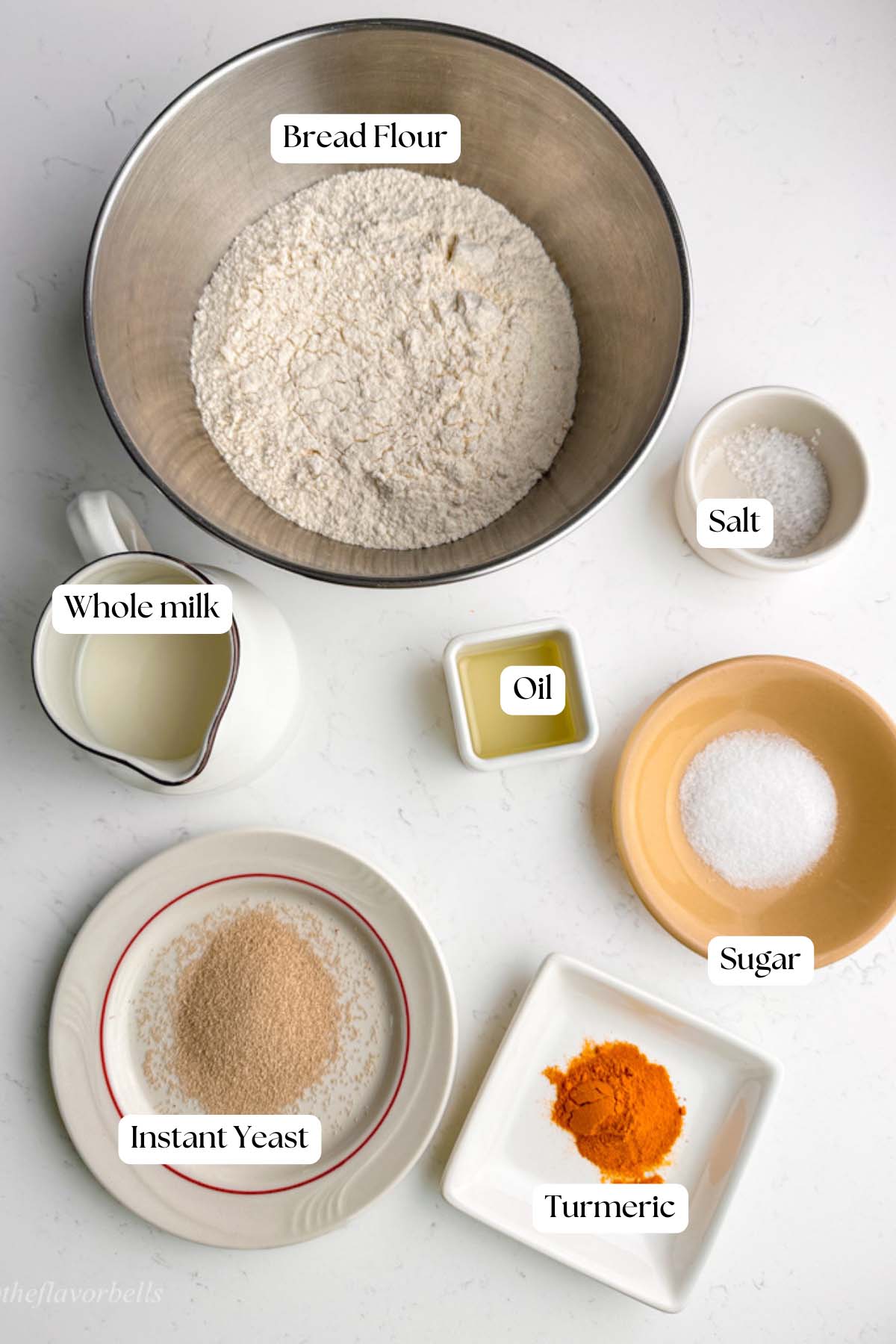image of all the ingredients required for making the sandwich bread colored and flavored with turmeric powder
