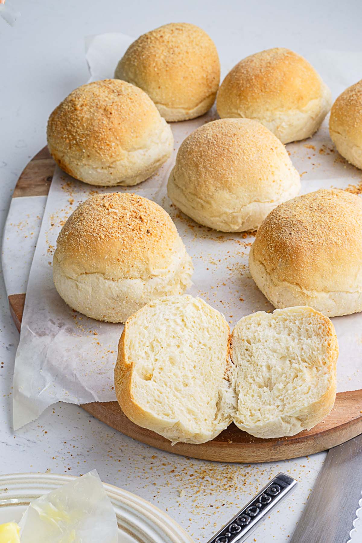 eggless filipino crumb coated pandesal on a serving board