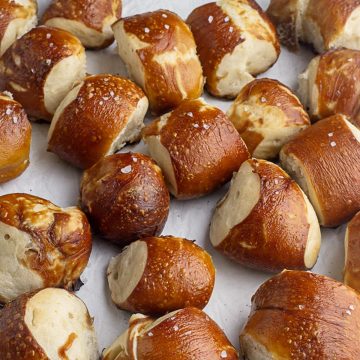 an image of homemade soft pretzels topped with coarse salt