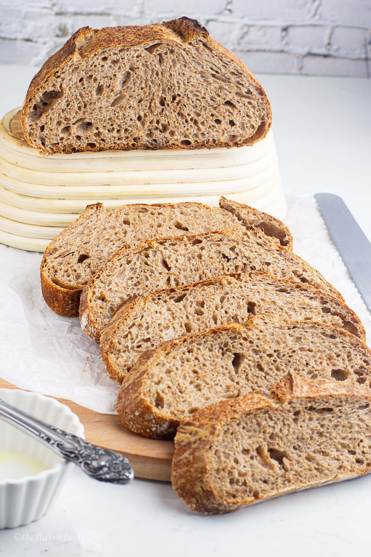 a half loaf of high fibre sourdough and slices of the remaining half